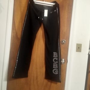 BCBG Maxzaria Pants with Logo BCBG on side and bottom pants.